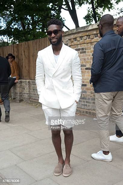 British rapper Tinie Tempah wears all Burberry and Celine 